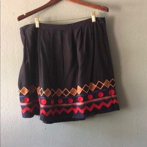 Navy Embroidered hem mini skater skirt